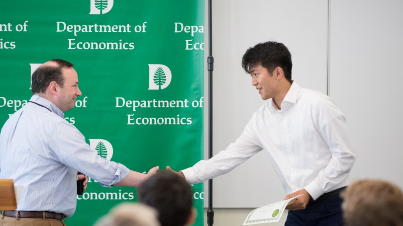 Genghe Zhu receiving Econ Dept Service Award